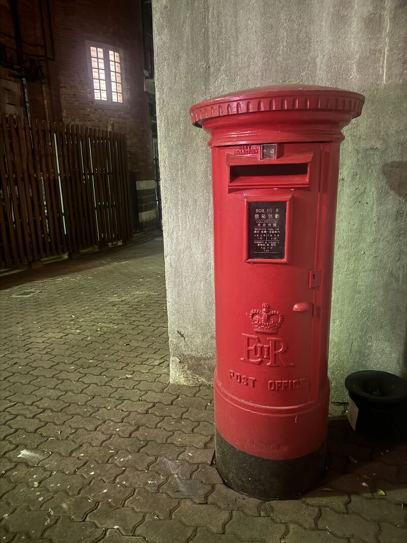 HK heritage postbox, lurking in the shadows painted brilliant red